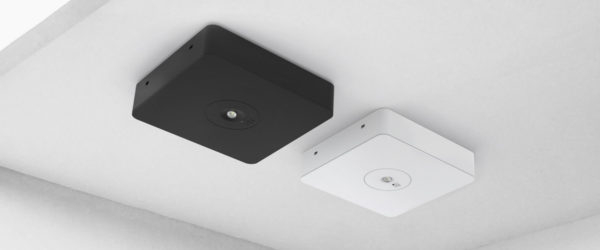 Black and white ceiling mounted emergency lights