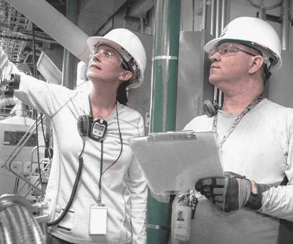 Engineers inspecting in a factory