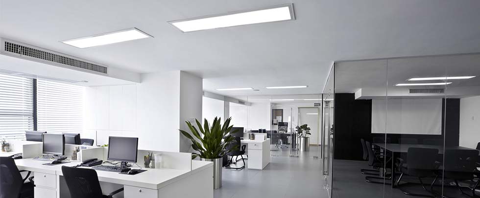 Commercial Office space with glass wall boardroom and LED troffer lights