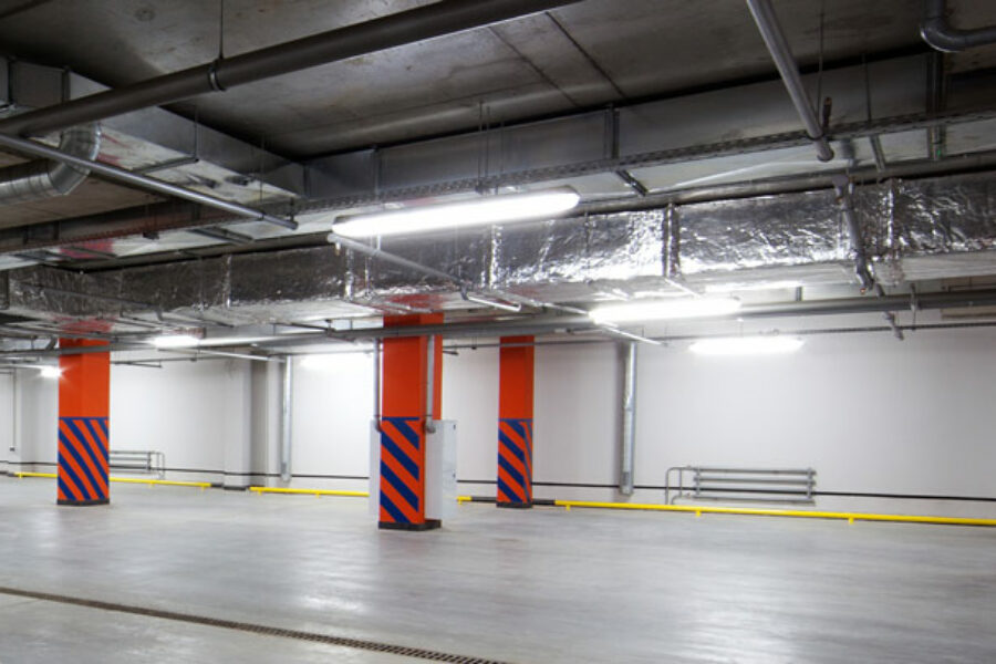 Batten lights illuminating an underground carpark